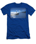 A Male Snowboarder Spinning Off a Jump Patrick Orton T-Shirt